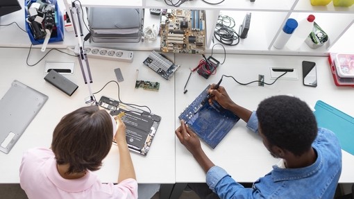 people-repairing-computer-chips