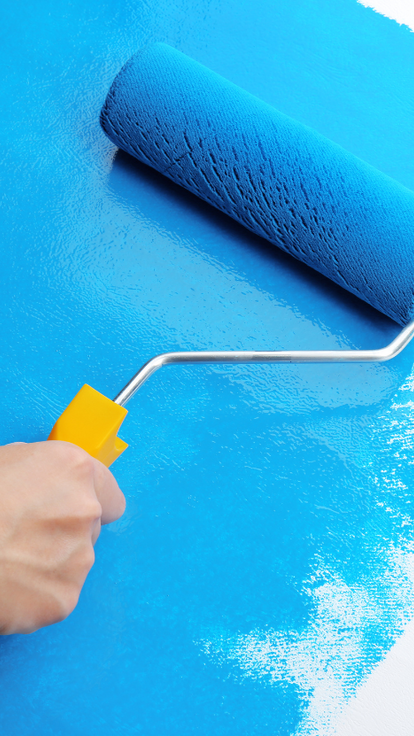 a blur roller rolling blue paint