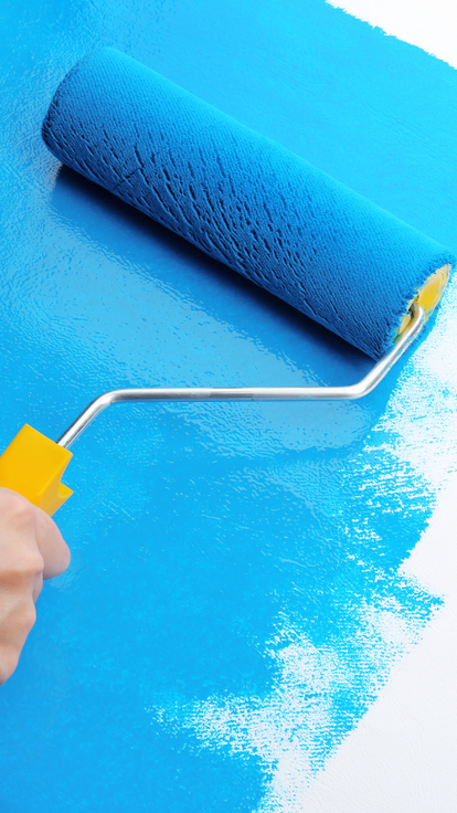a blur roller rolling blue paint