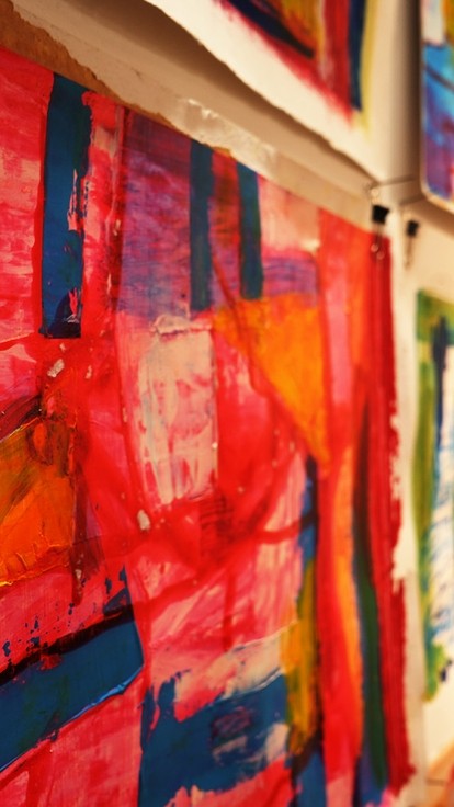 A close up of Access to HE work a very colourful piece made of a number of squares