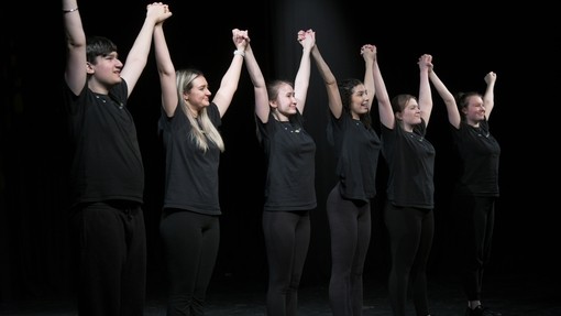 Students take a bow.