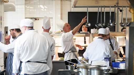 Student chefs in white uniforms