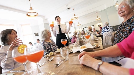 Customers having drinks at a training restaurants