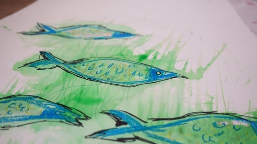 Blue and green fish drawn