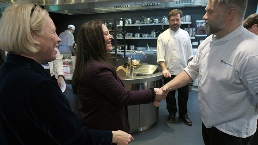 In the Aberista kitchen area with catering lecturer in whites