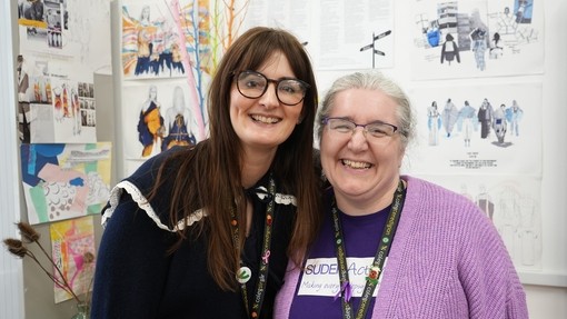 Rebecca Sellick standing next to Helen Yates who is wearing Purple Day branding