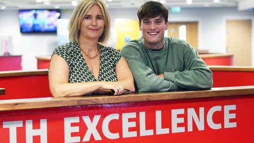 Vanessa with Jack Wooller looking at the camera