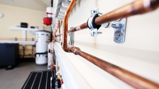 Copper piping on a wall
