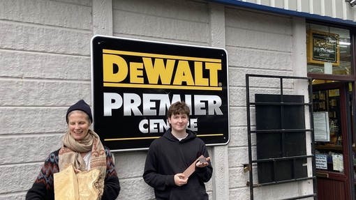 Staff outside Timberman store