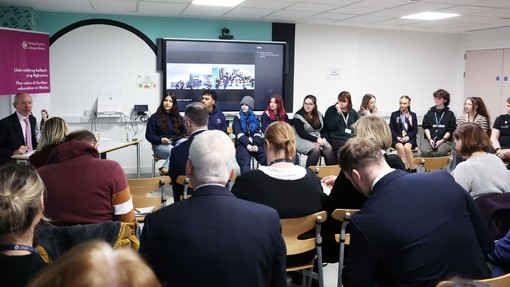 Students inside taking part in the panel