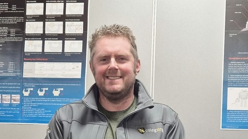 Karl Hilton looking at camera in engineering