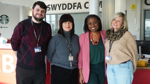 Rachel Clarke in Graig campus reception pictured with three A-level staff including head of A-levels