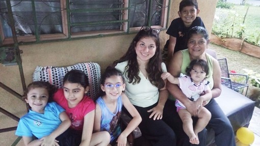 Hannah with her Costa Rican family in the house