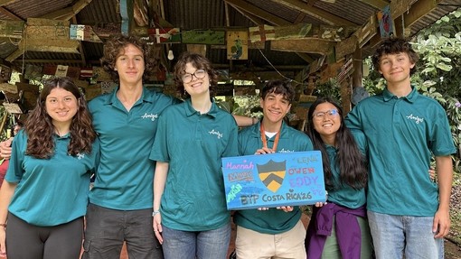 Hannah with her friends in Princeton gear