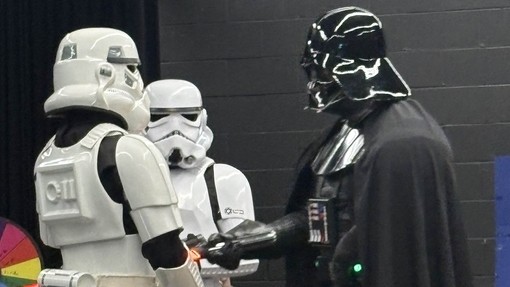 Darth Vader and a few stormtroopers having a chat