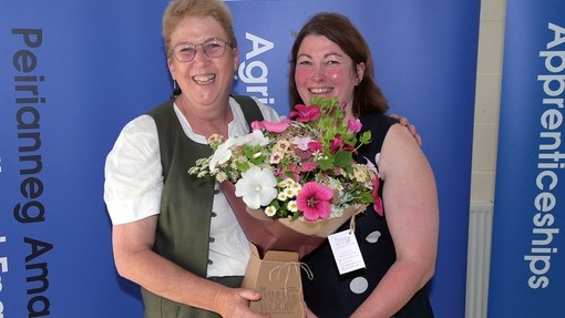 Liz, head of agri, with the guest speaker and a bunch of flowers