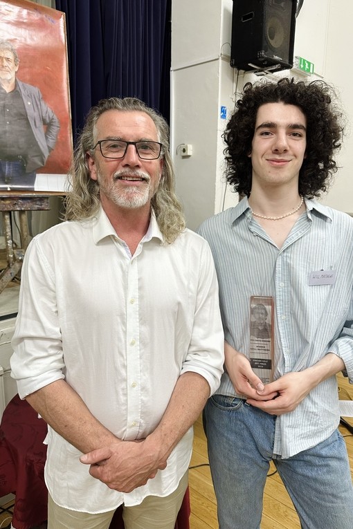 Luke Osmond and Will Matthews holding award