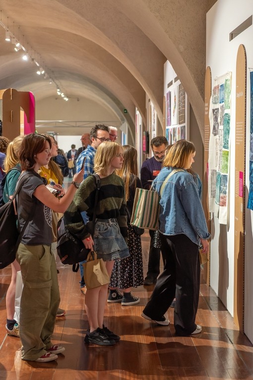 The students in the gallery at Somerset House viewing work