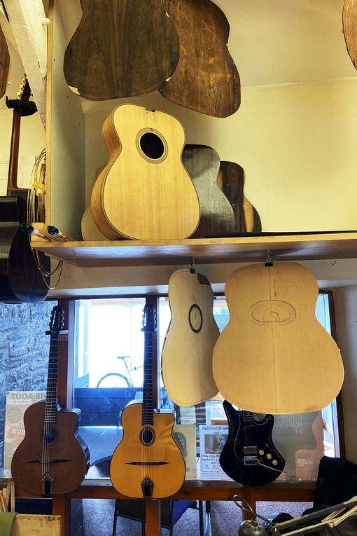 A range of guitars on display