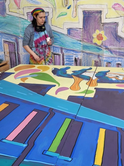 Student working on the boards at college
