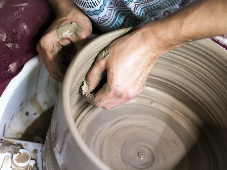 A student tries pottery.