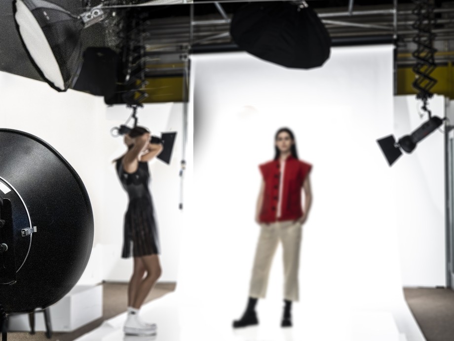 A fashion student takes part in a photoshoot. 