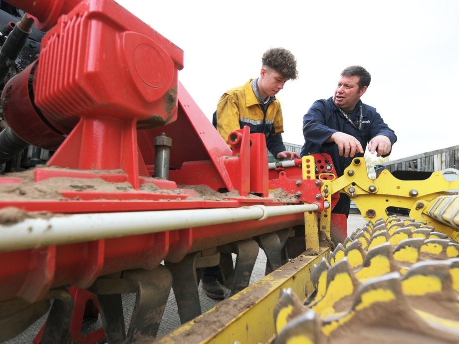 A student learns about tractors.