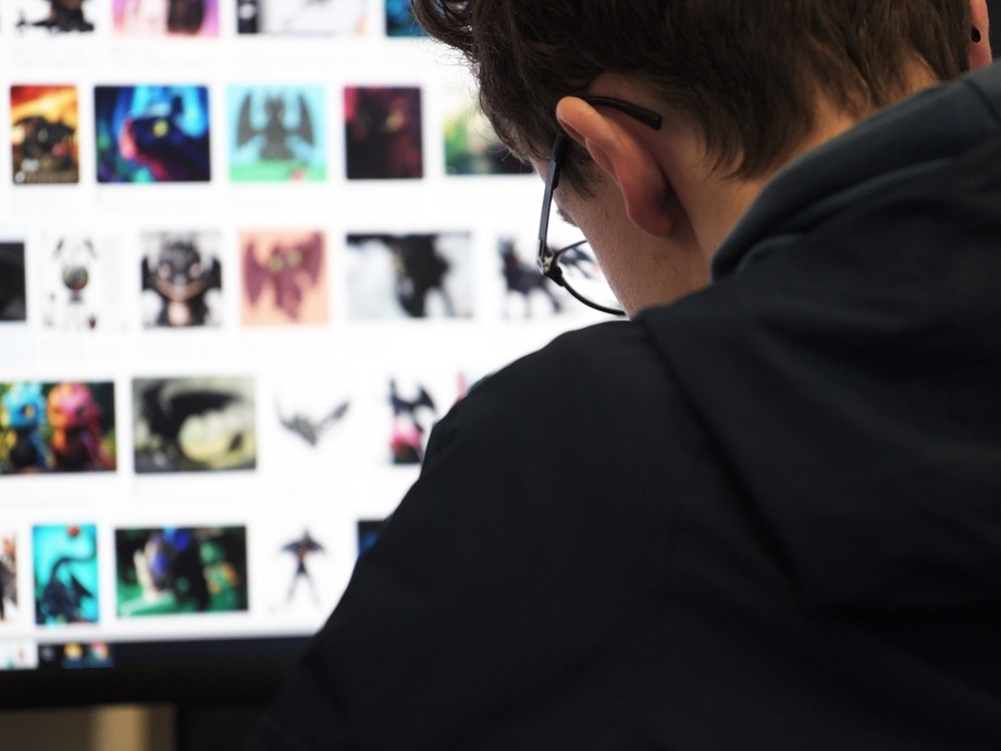 A student designing a game character.