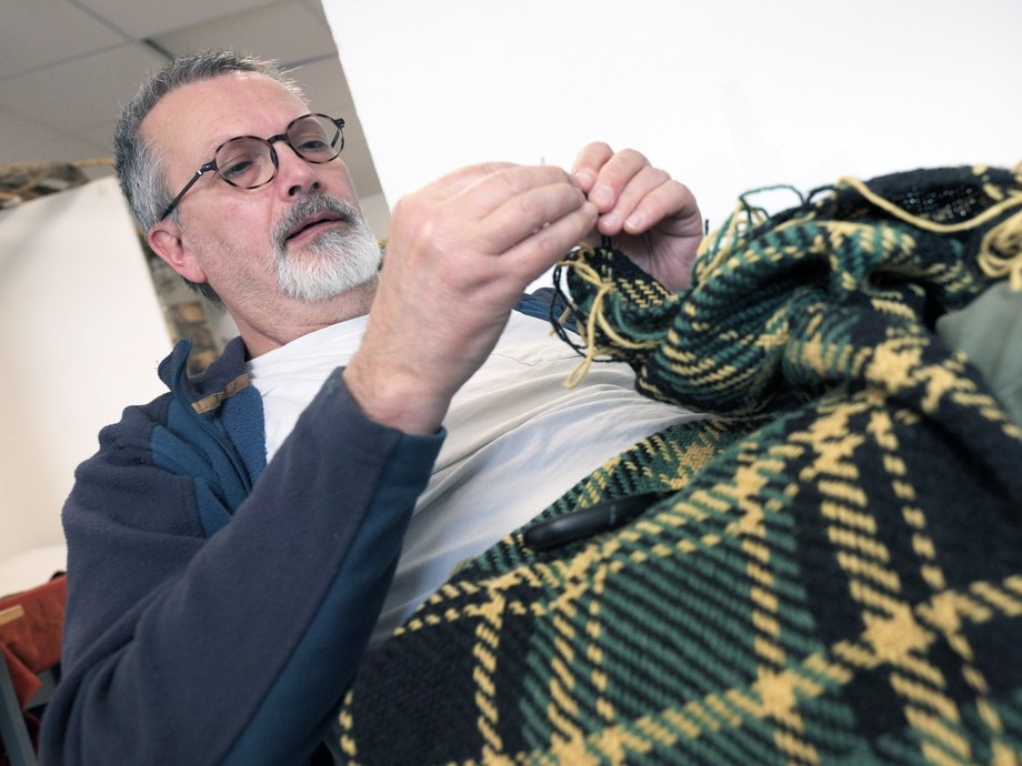 A student working on a blanket. 