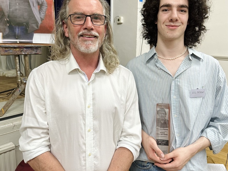 Luke Osmond and Will Matthews holding award