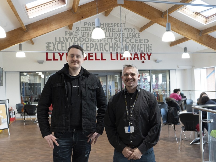 Alex and tutor Nick standing at the entrance to Starbucks and the library 