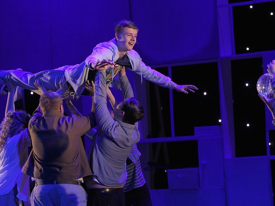 group of performing art students on stage