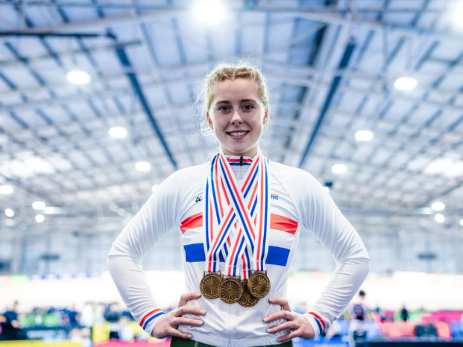 Emma Finucane with multiple olympic medals around her neck