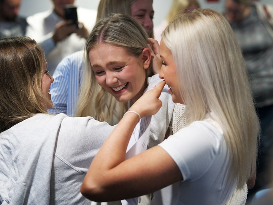 girls looking overjoyed and overwhelmed 