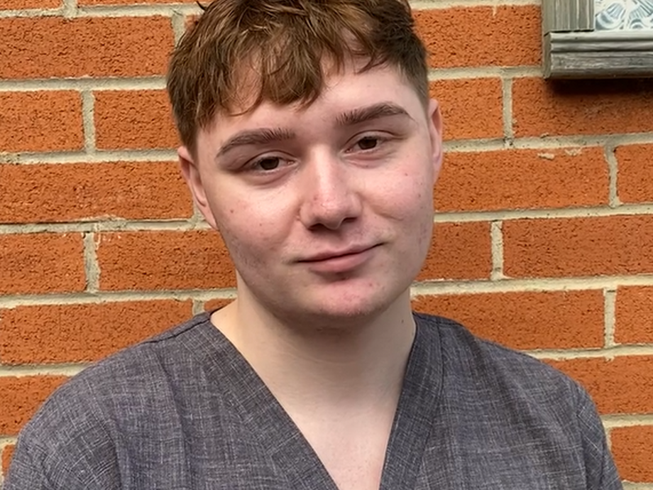 Beauty Therapy student Leo smiling at camera