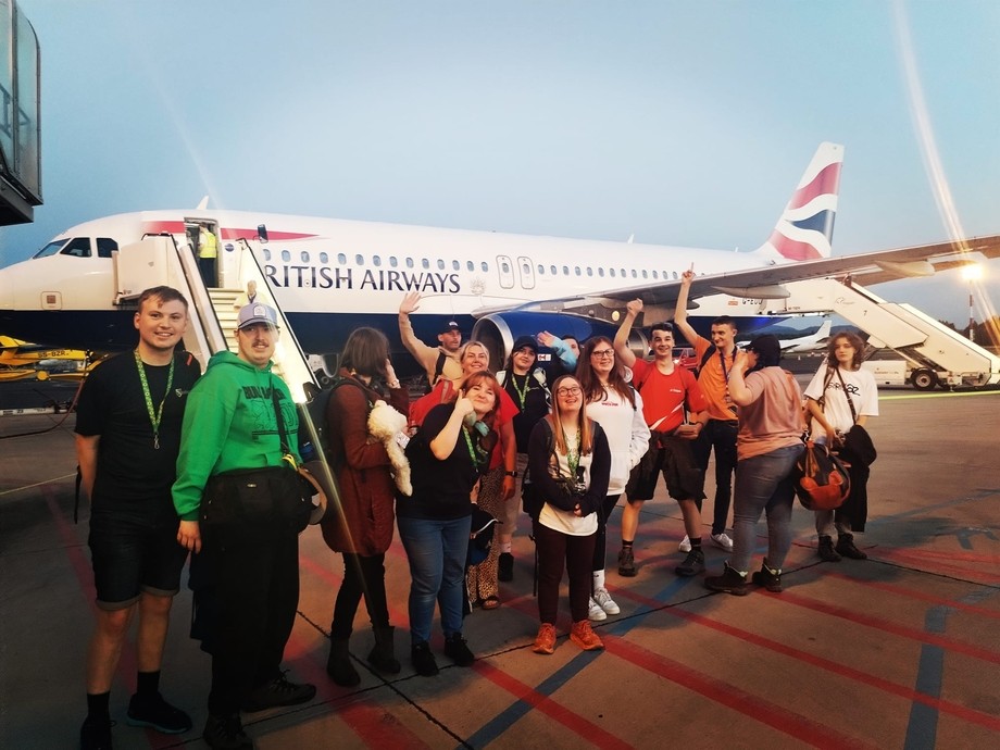 Students on the airfield next to their field