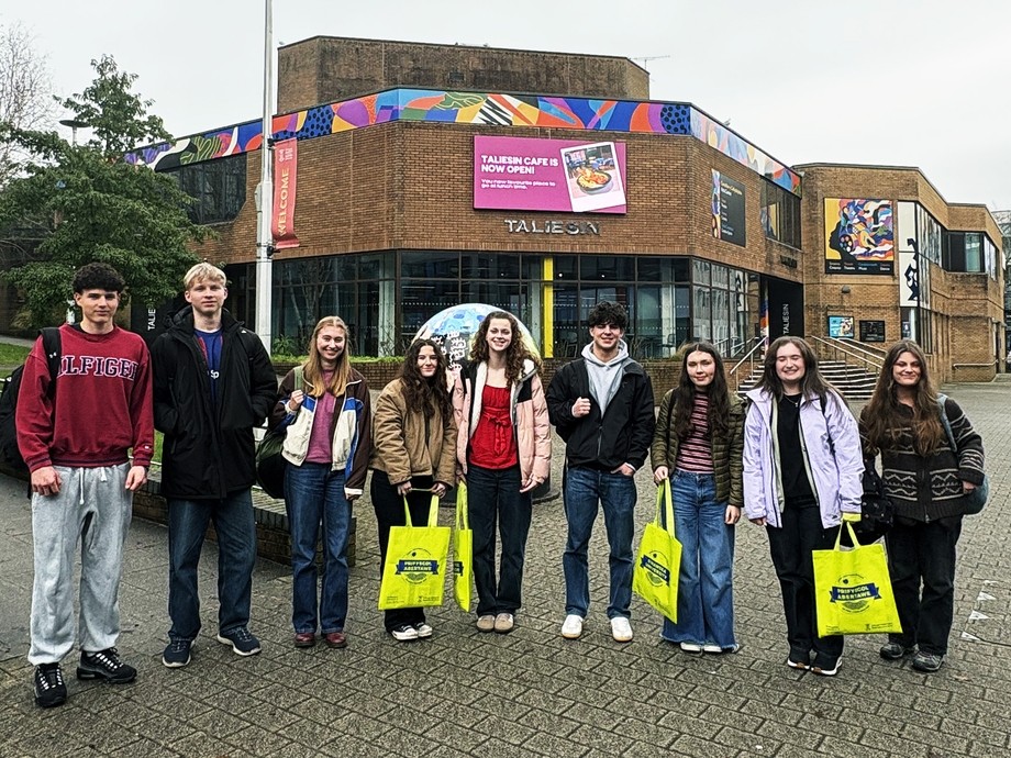 Students standing outside the university's Taliesin Theatre