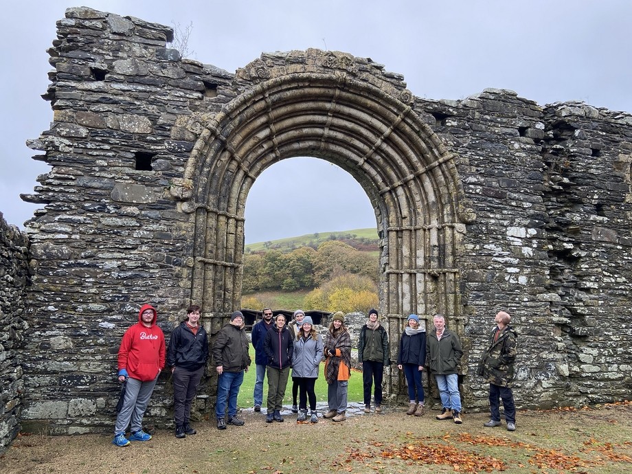 Students at the Abbey with the iconic archway