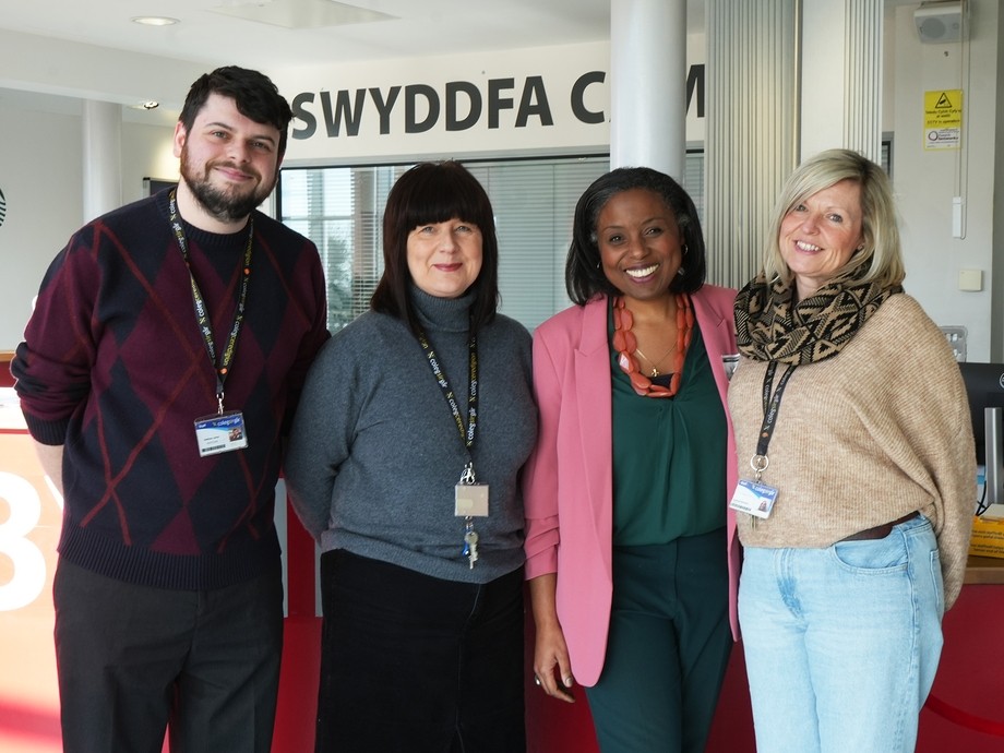 Rachel Clarke in Graig campus reception pictured with three A-level staff including head of A-levels