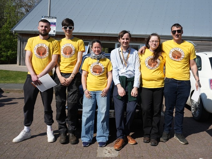 Students with Paul and Sister Ally in a row wearing Skanda Vale tops