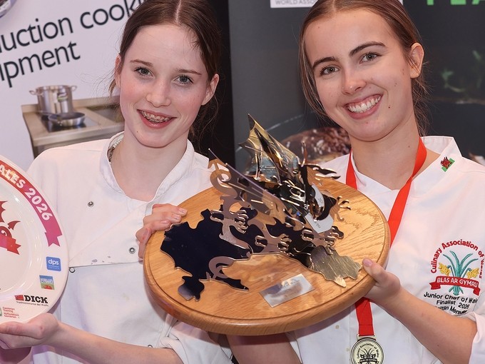 Caitlin Meredith with fellow student Freya Inman holding her awards (candidates are allowed to take someone to assist)