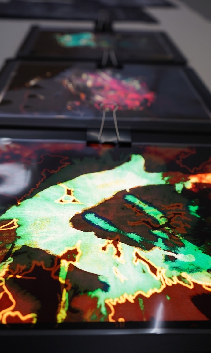 A close up image of Philip's earthy volcanic shapes which are background lit