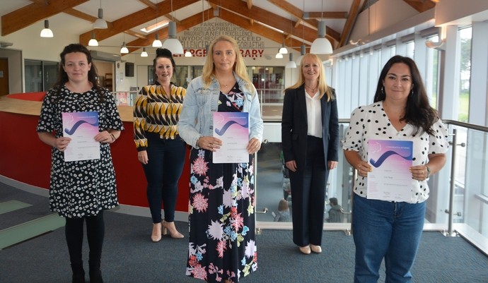 A line up of staff who were commended by Pearson for their teaching