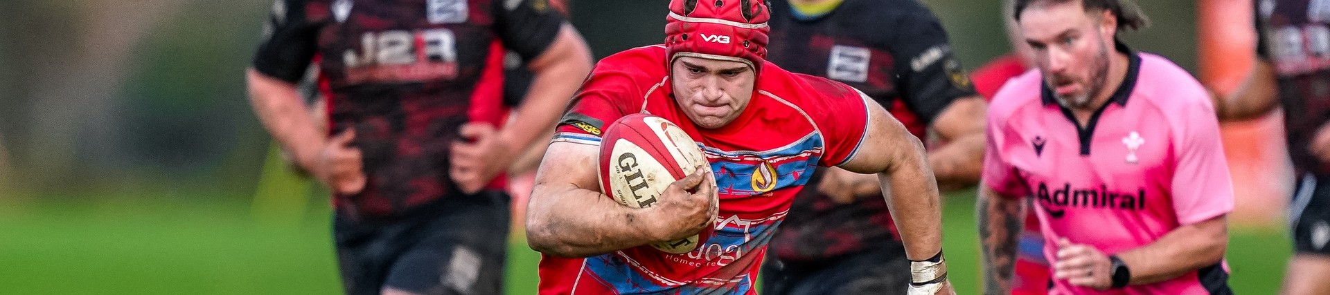 Student athletes playing rugby.
