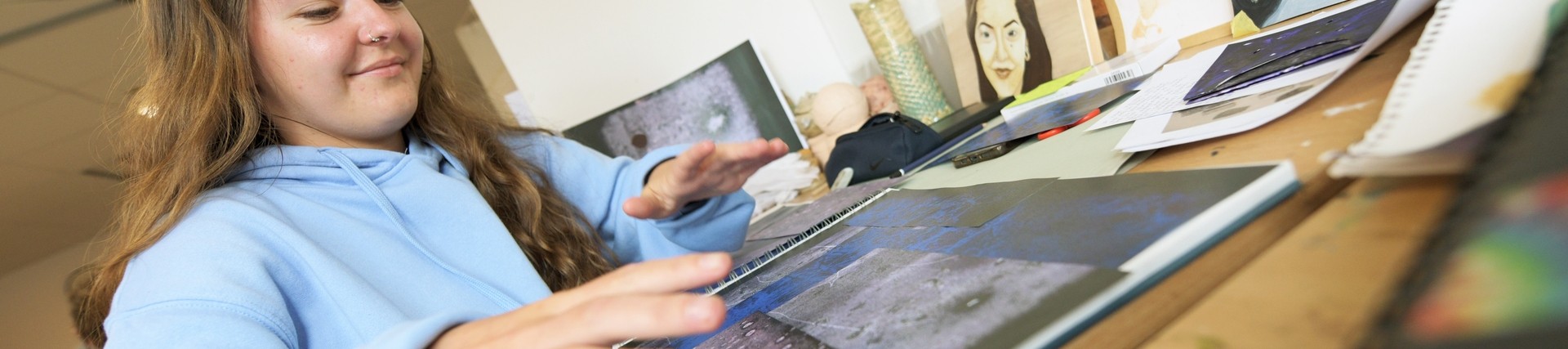 A student working on an art piece.