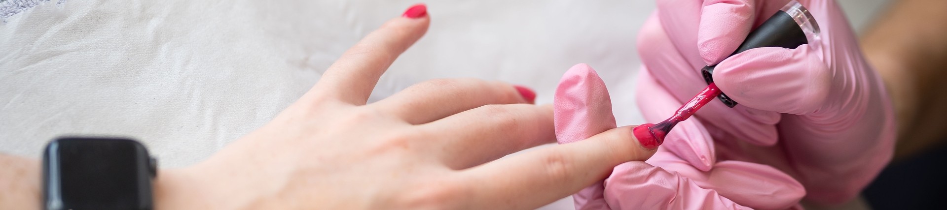 Student giving manicure