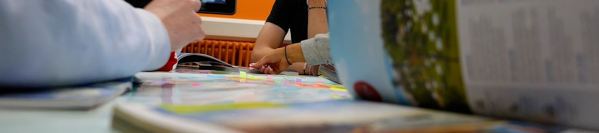 Students annotate a map.