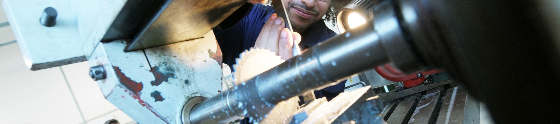 Student working with engineering machinery