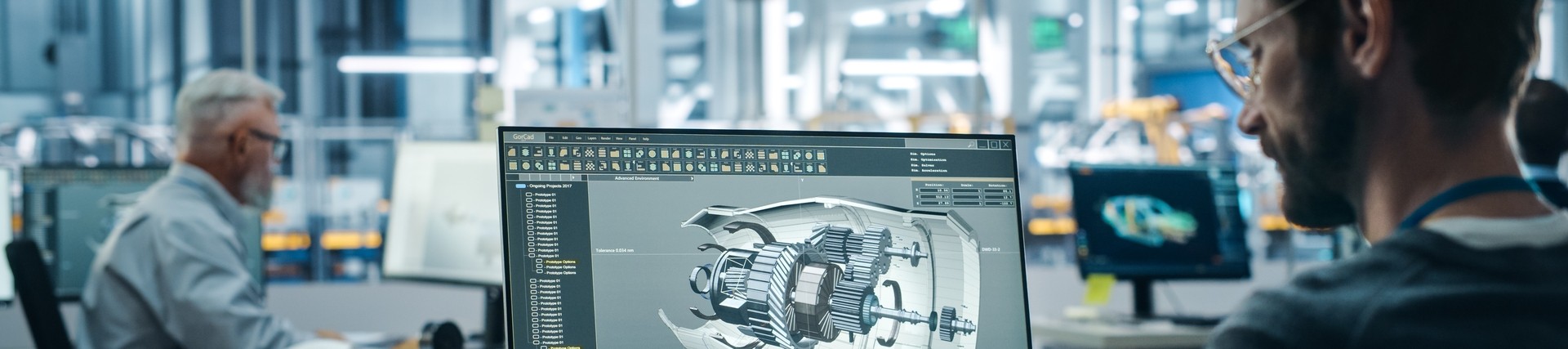 someone in an office creating technical designs on a computer