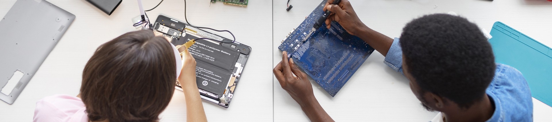 people-repairing-computer-chips
